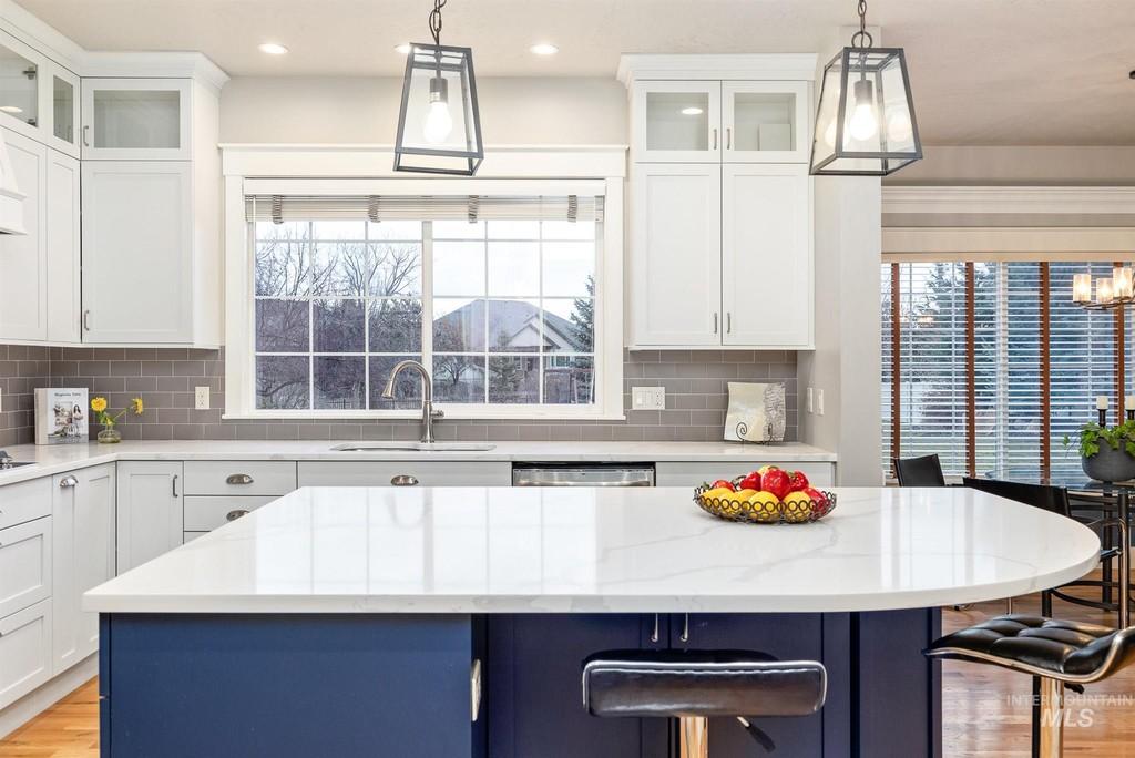 A white and navy blue modern kitchen design